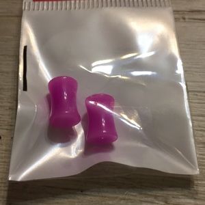 Pink plugs body jewelry